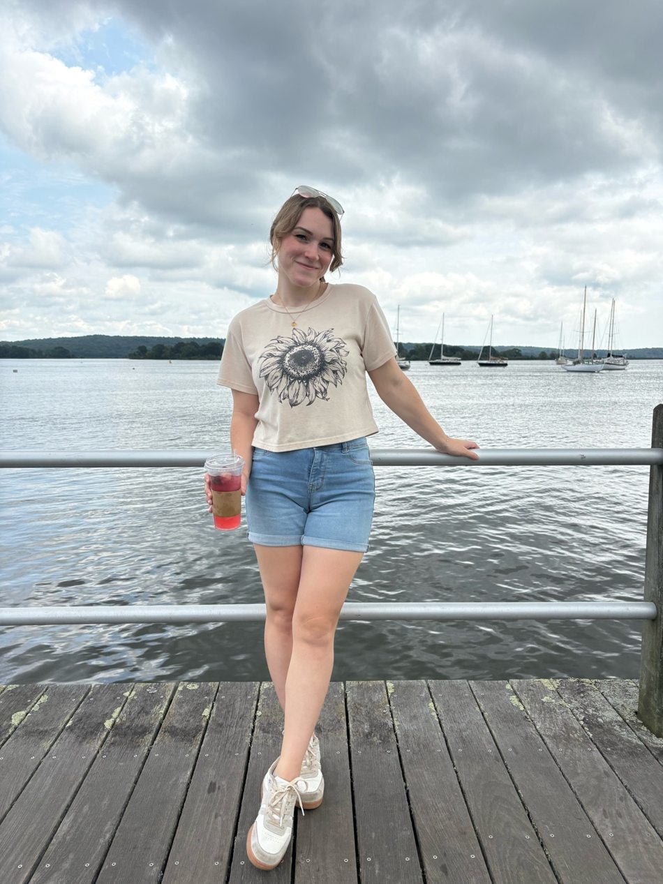 Maria, founder of Carefully Cleaned Living, by the waterfront